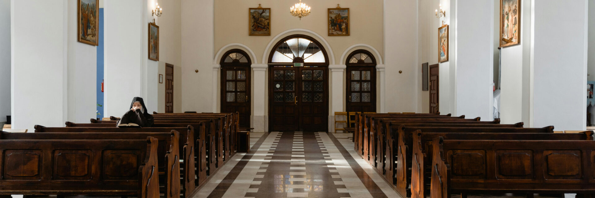 Inside a church with pews 3x1.jpg scaled.jpg