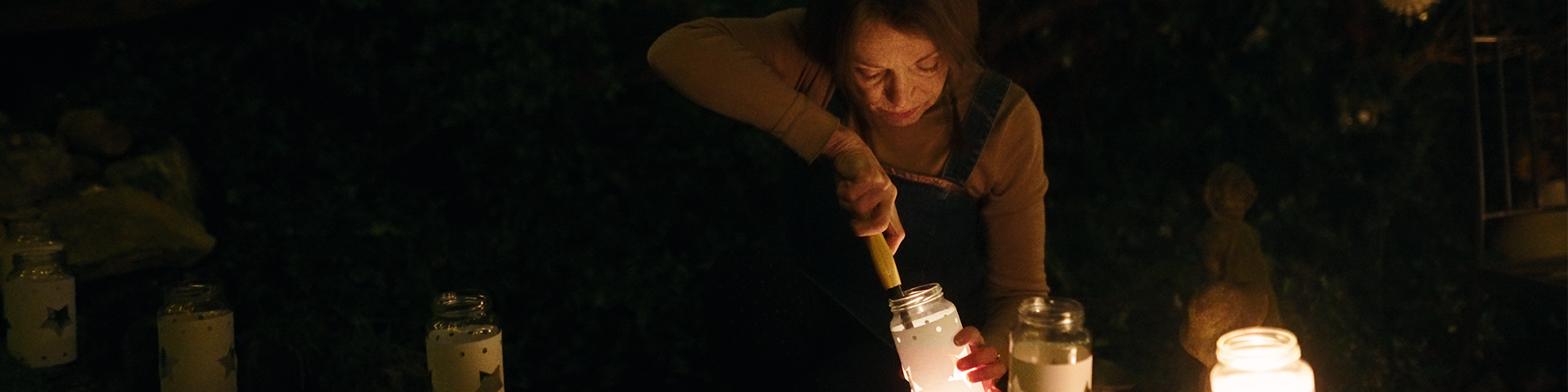 Woman lighting candles