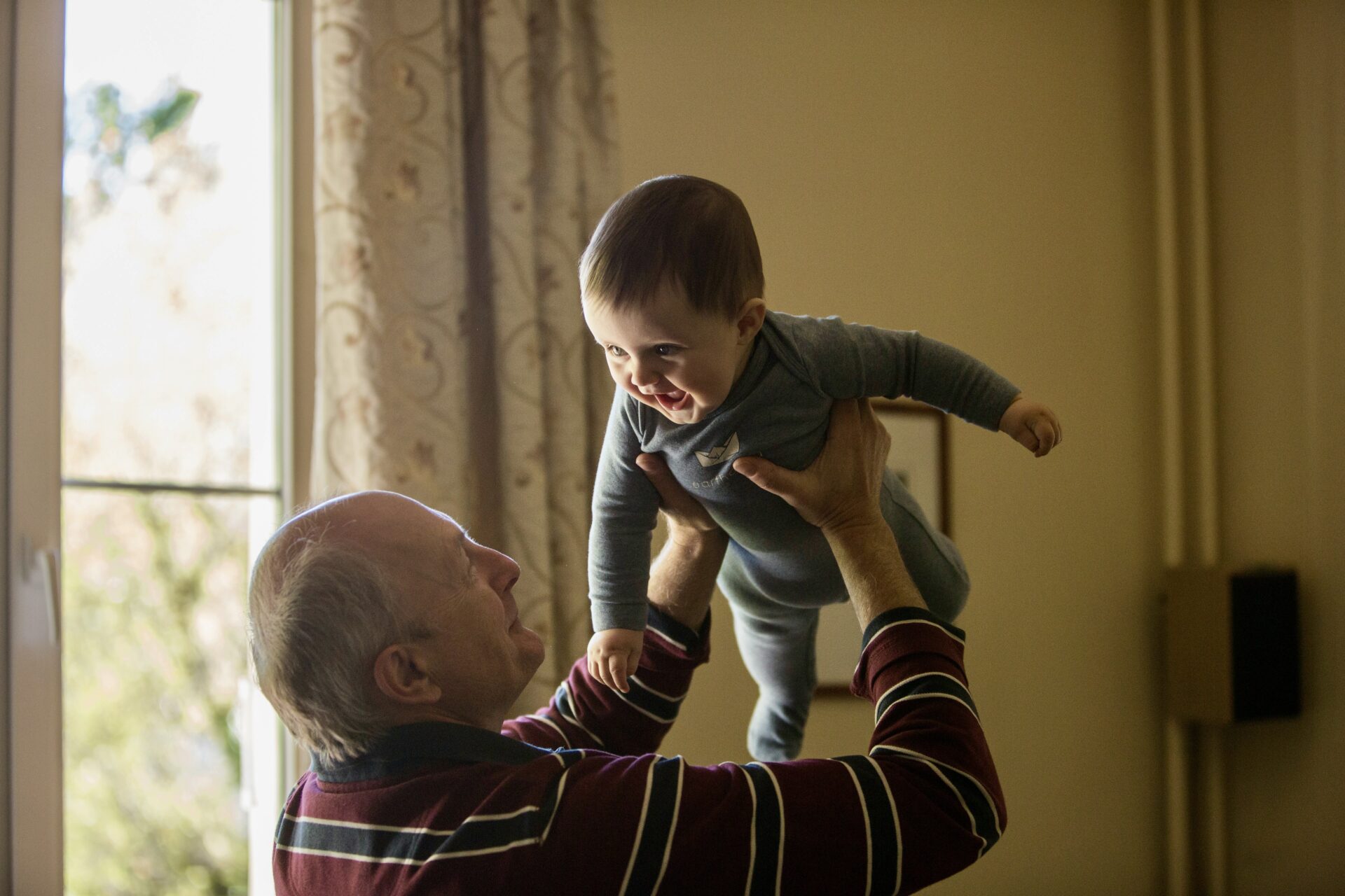 Grandparent playing with grandchild