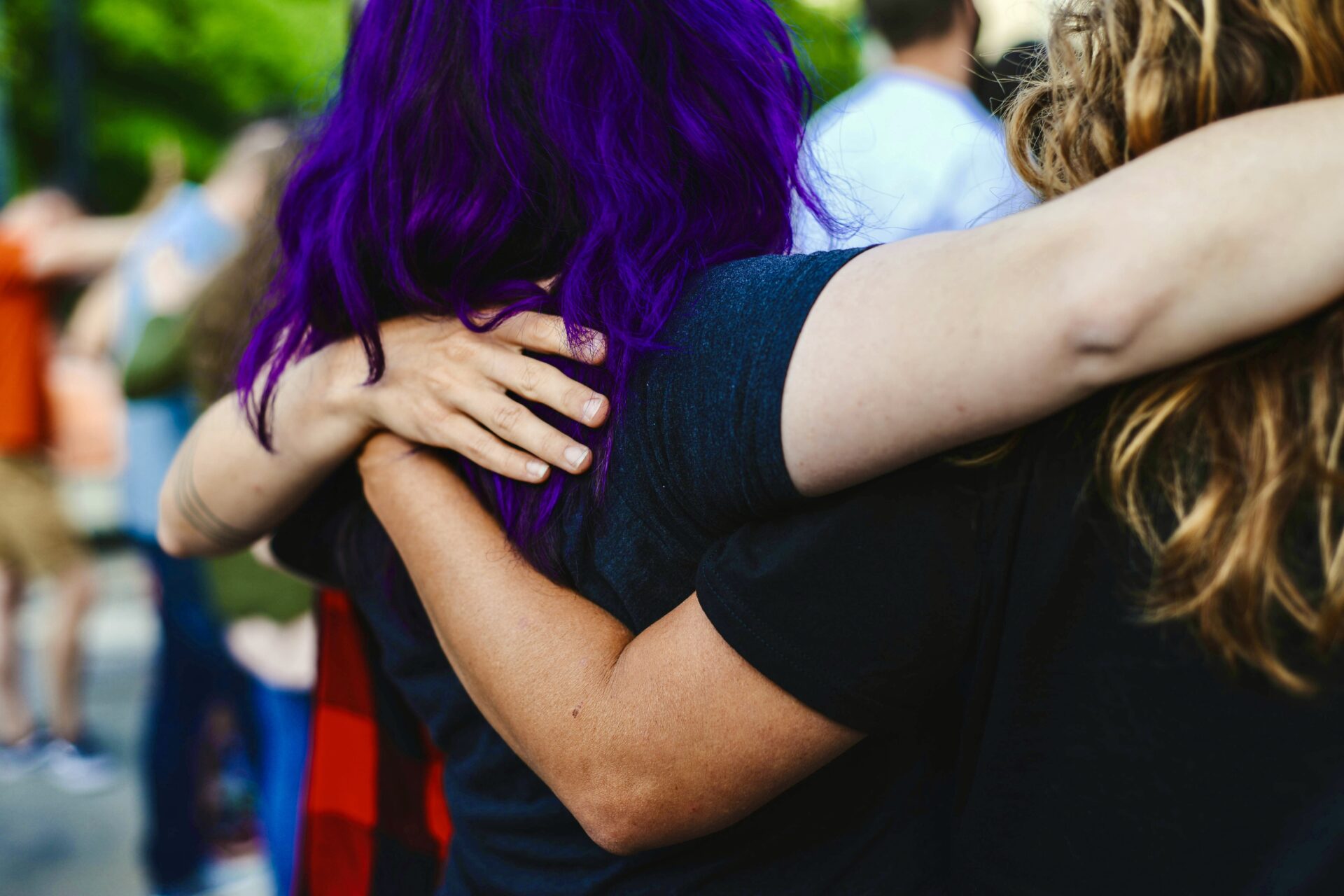 People hugging at event