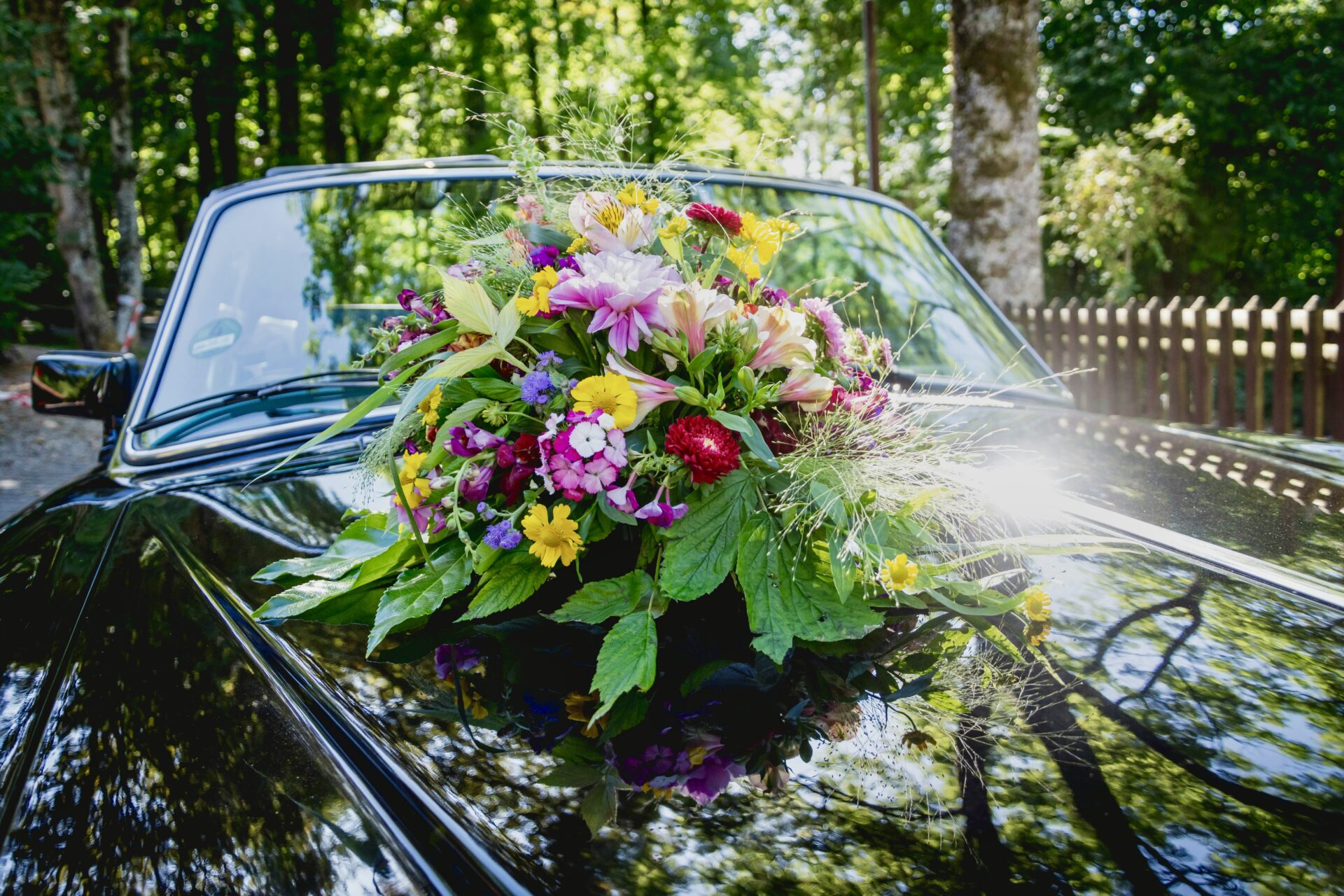 Grandad Funeral Flowers Ideas: Honour His Memory 3 Flowers on a car