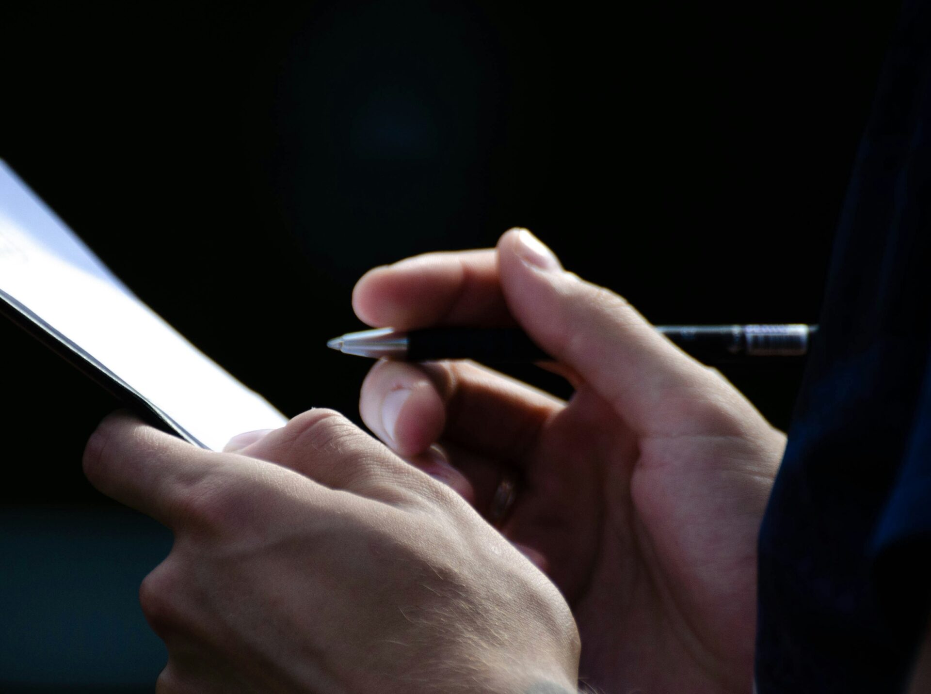 Man writing on paper