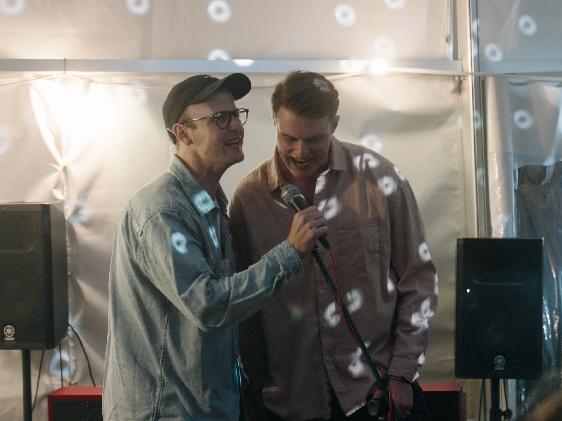 Honouring Loved Ones with Meaningful Celebration of Life Ideas 25 Two men karoke party